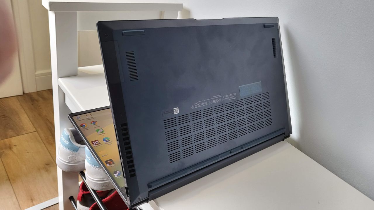 Asus Zenbook OLED 15 (2023) on a shelf