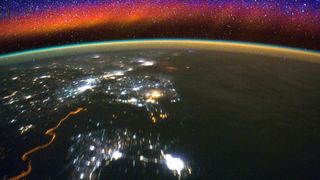A view from the International Space Station shows different colors of airglow.
