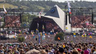 Crowds of people gather in front of the main Pyramid Stage to watch Diana Ross perform at the 2022 Glastonbury Festival 