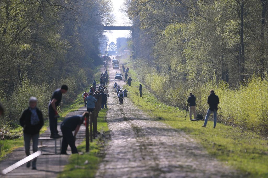 Fans wait for riders to preview the Arenberg sector