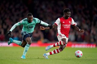 Leicester City’s Patson Daka is booked for a foul on Arsenal’s Bukayo Saka during the Premier League match at the Emirates Stadium, London. Picture date: Sunday March 13, 2022