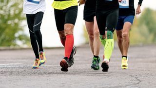 road runners wearing compression socks