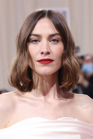 Alexa Chung is pictured with a wavy bob, whilst attending "In America: An Anthology of Fashion," the 2022 Costume Institute Benefit at The Metropolitan Museum of Art on May 02, 2022 in New York City.