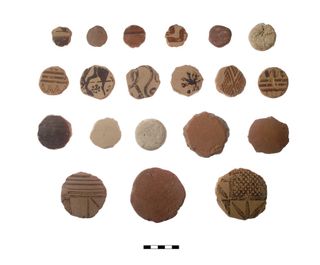 Cut clay disks from ancient Greece