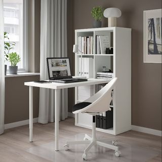 White table desk in brown living room