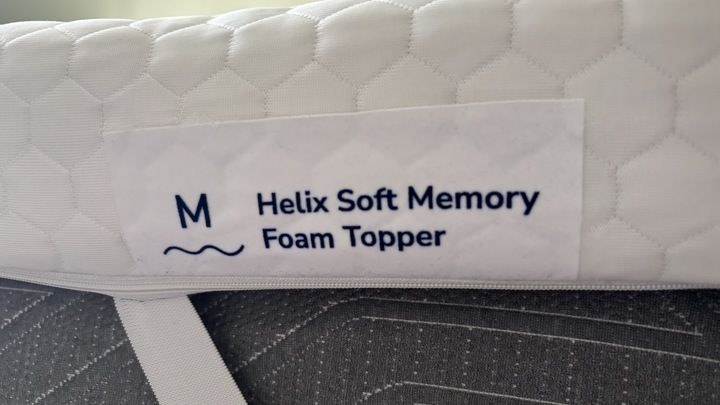 A close-up look at the logo of the Helix Premium Memory Foam Mattress Topper with GlacioTex.