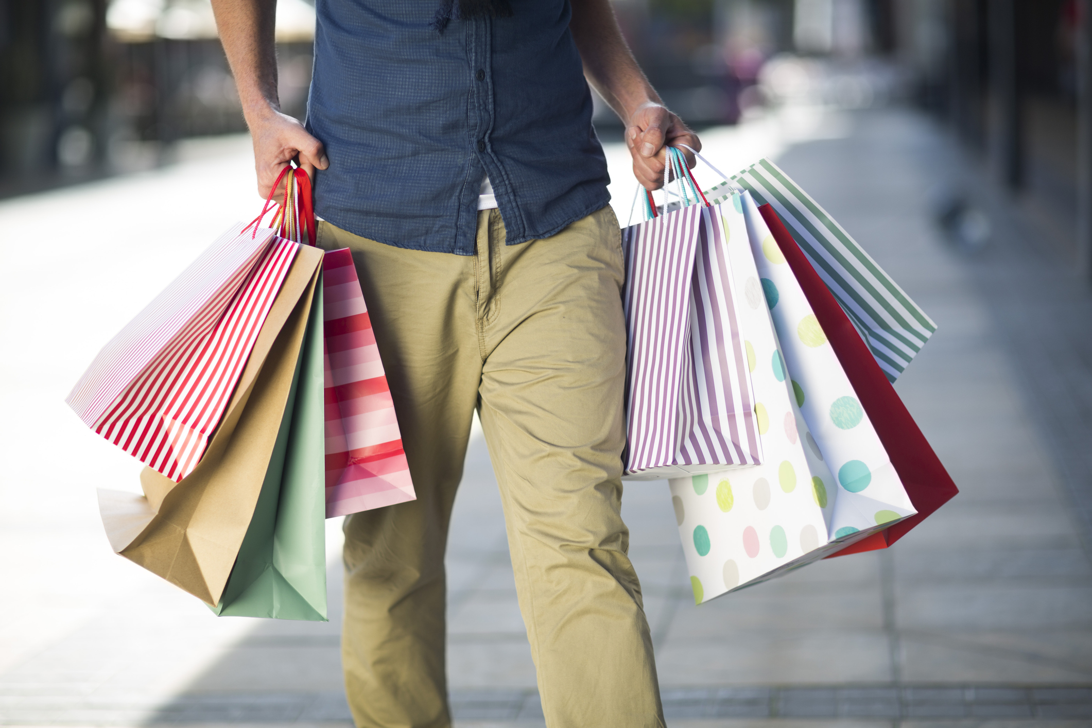 Man holding shopping bags