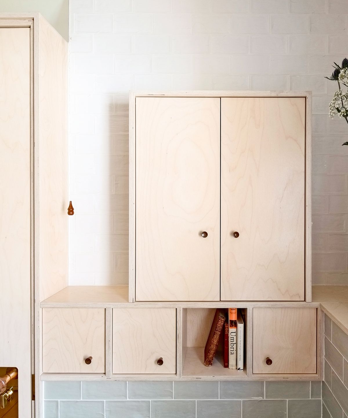 Birch plywood storage in a bathroom