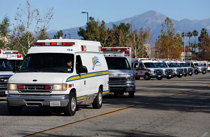 Ambulances and police cars in San Bernardino.
