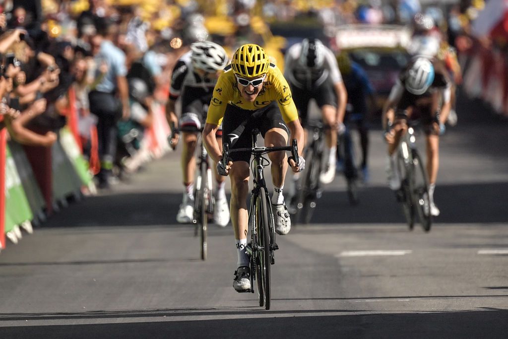 Geraint Thomas (Team Sky) sprints to the win on Alpe d'Huez