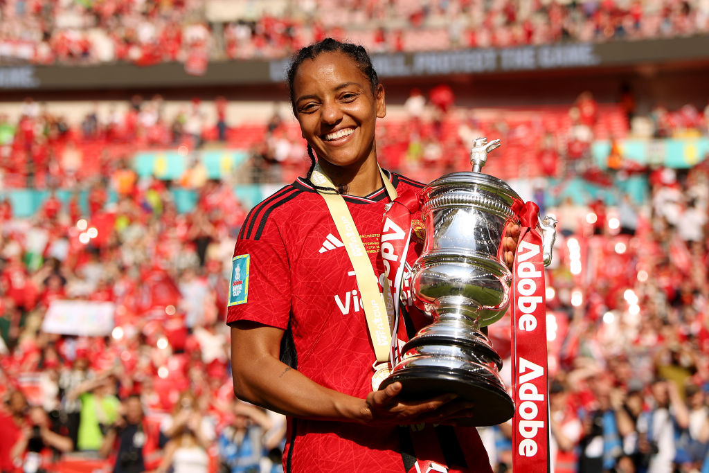 Geyse Da Silva Ferreira of Manchester United celebrates with the FA Cup trophy after winning the Adobe Women's FA Cup Final match between Manchester United and Tottenham Hotspur at Wembley Stadium on May 12, 2024 in London, England.