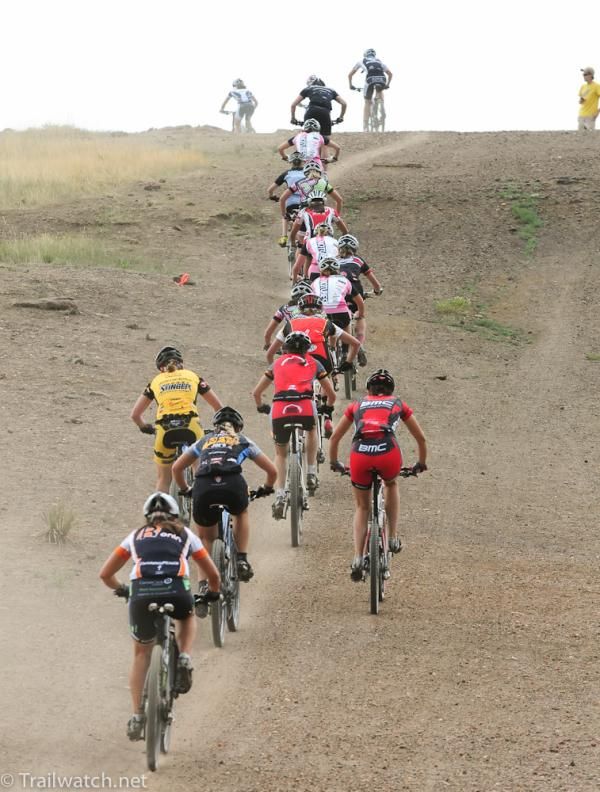 The elite women crest the first ridge on the course