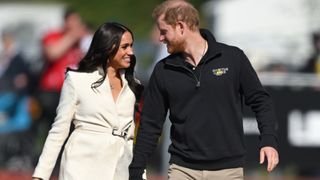 Prince Harry, Duke of Sussex and Meghan, Duchess of Sussex attend the athletics event during the Invictus Games at Zuiderpark on April 17, 2022 in The Hague, Netherlands.