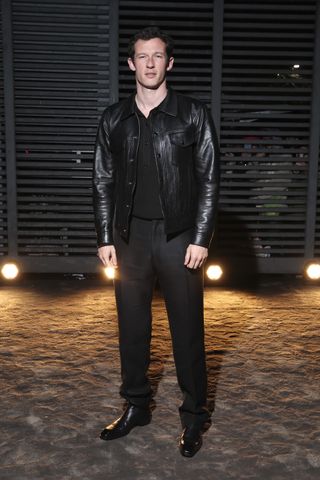 Callum Turner attends Tom Ford's show in Milan