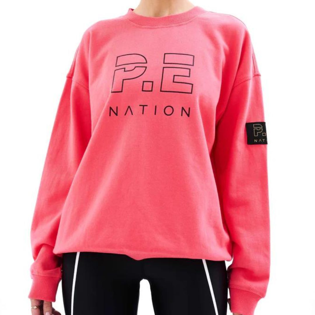 Plank every day for a week: PE Nation pink sweater