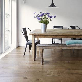 dining area with wooden floor and dining table and chair