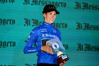 ALDENO ITALY JULY 08 Marta Cavalli of Italy and Team FDJ Nouvelle Aquitaine Futuroscope Best Italian Blue Jersey celebrates at podium during the 33rd Giro dItalia Donne 2022 Stage 8 a 1047km stage from Rovereto to Aldeno GiroDonne UCIWWT on July 08 2022 in Aldeno Italy Photo by Dario BelingheriGetty Images