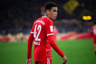 Jamal Musiala looks on during the Bayern Munich vs Borussia Dortmund game