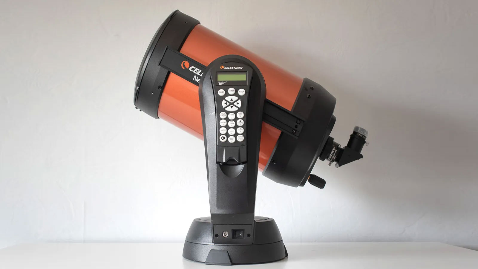 Check photos of the Celestron NexStar 8SE telescope with its orange optical tube 