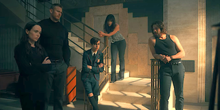 The Umbrella Academy Hargreeves siblings stand by a staircase in the Season 2 finale.