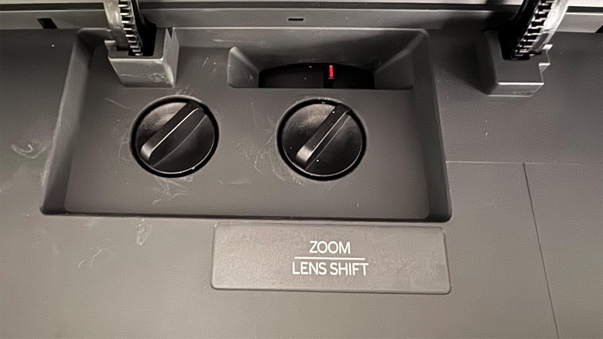 Optoma UHZ68LV home cinema projector detail of lens shift controls