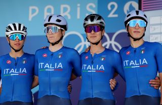 The Italian team line up at sign on for the women's Olympic road race 2024