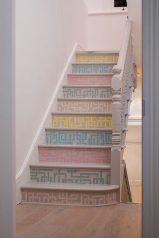 painted stencilled stairs by Farrow & Ball in pastel colours