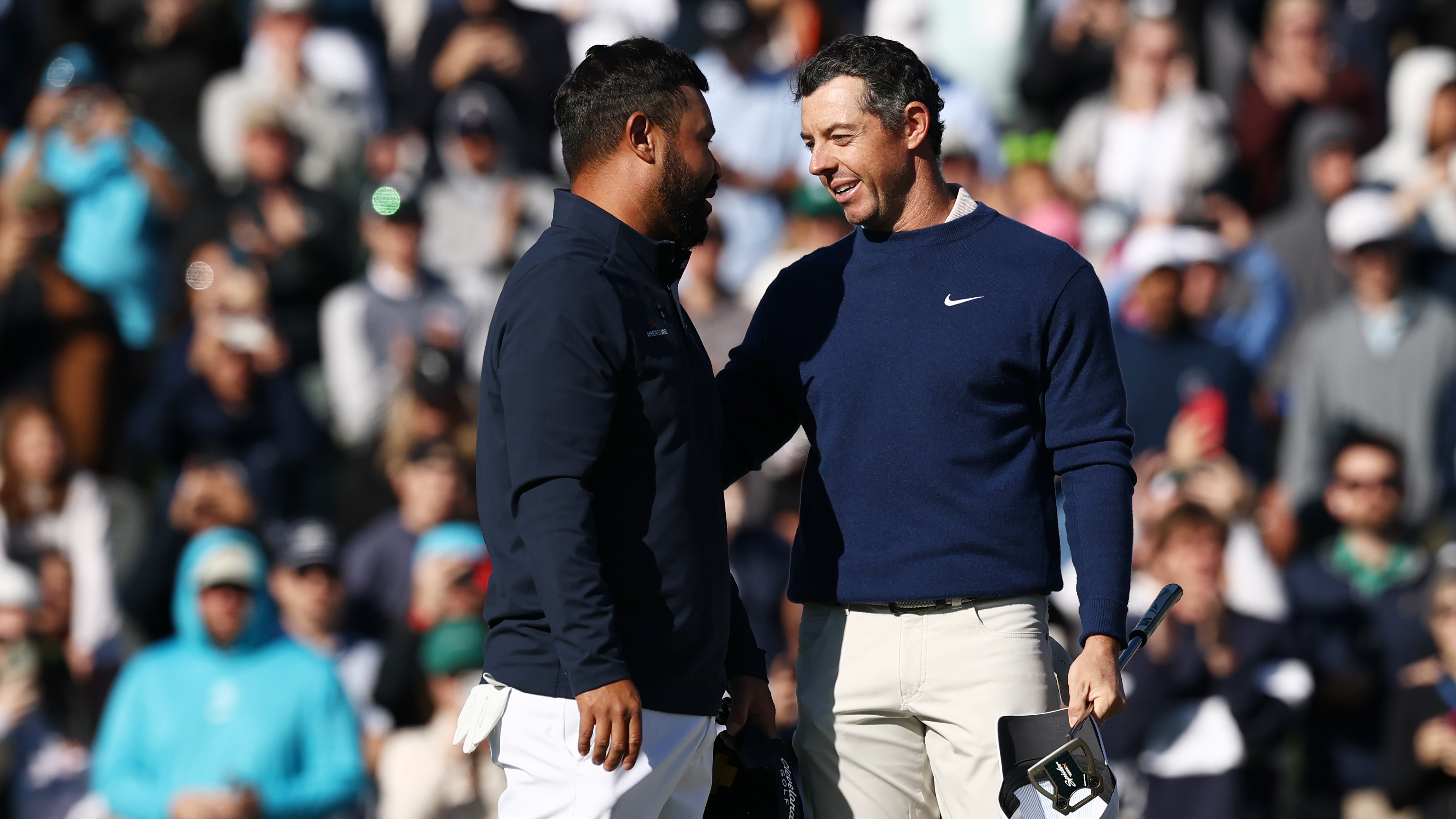 Rory McIlroy and JJ Spaun on the final green at The Players Championship 2025 following the Northern Irishman's victory