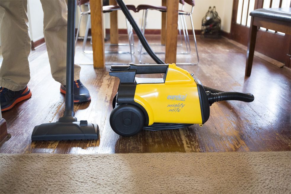 The Mighty Mite has a blower port that you can use to blow debris out of your garage.