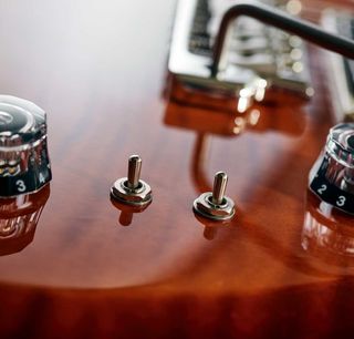 The true single-coil splits provide versatile duality. They differ from PRS’s partial-split style, plus the individual split switches give a total of eight sounds in conjunction with the three-way toggle switch.