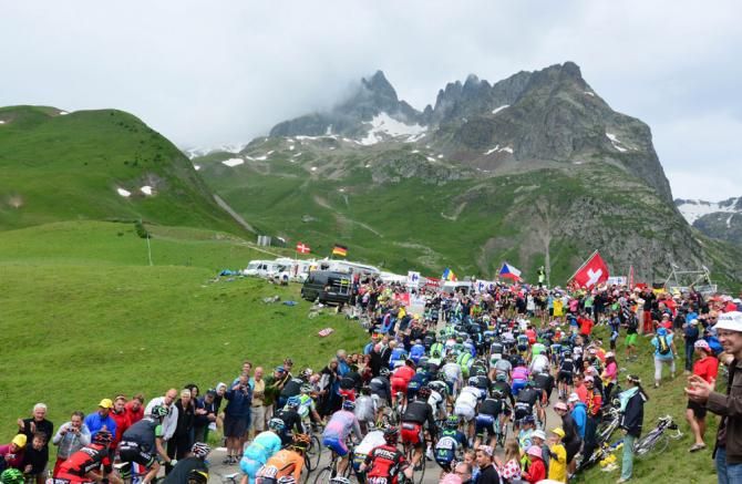 The crowds were out in force as the Tour de France peloton rolls through the Alps