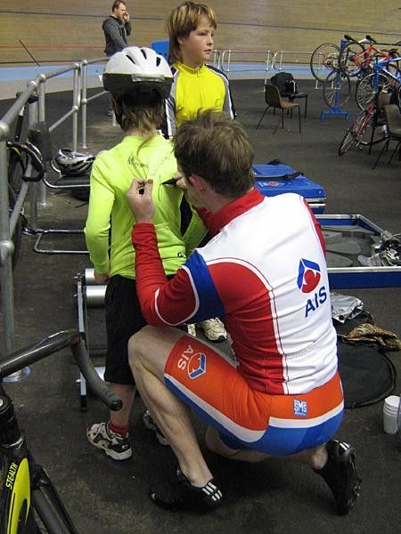 Ryan Bayley signs an autograph