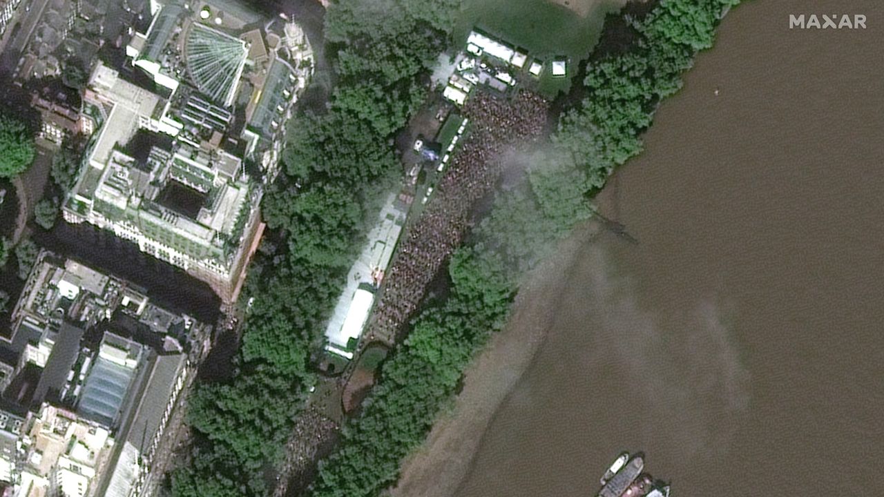 Satellite imagery taken by Maxar Technologies show hundreds of thousands of people waiting in line to pay respects to Queen Elizabeth II.