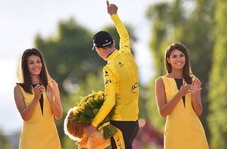 Chris Froome gives the thumbs up to the crowd