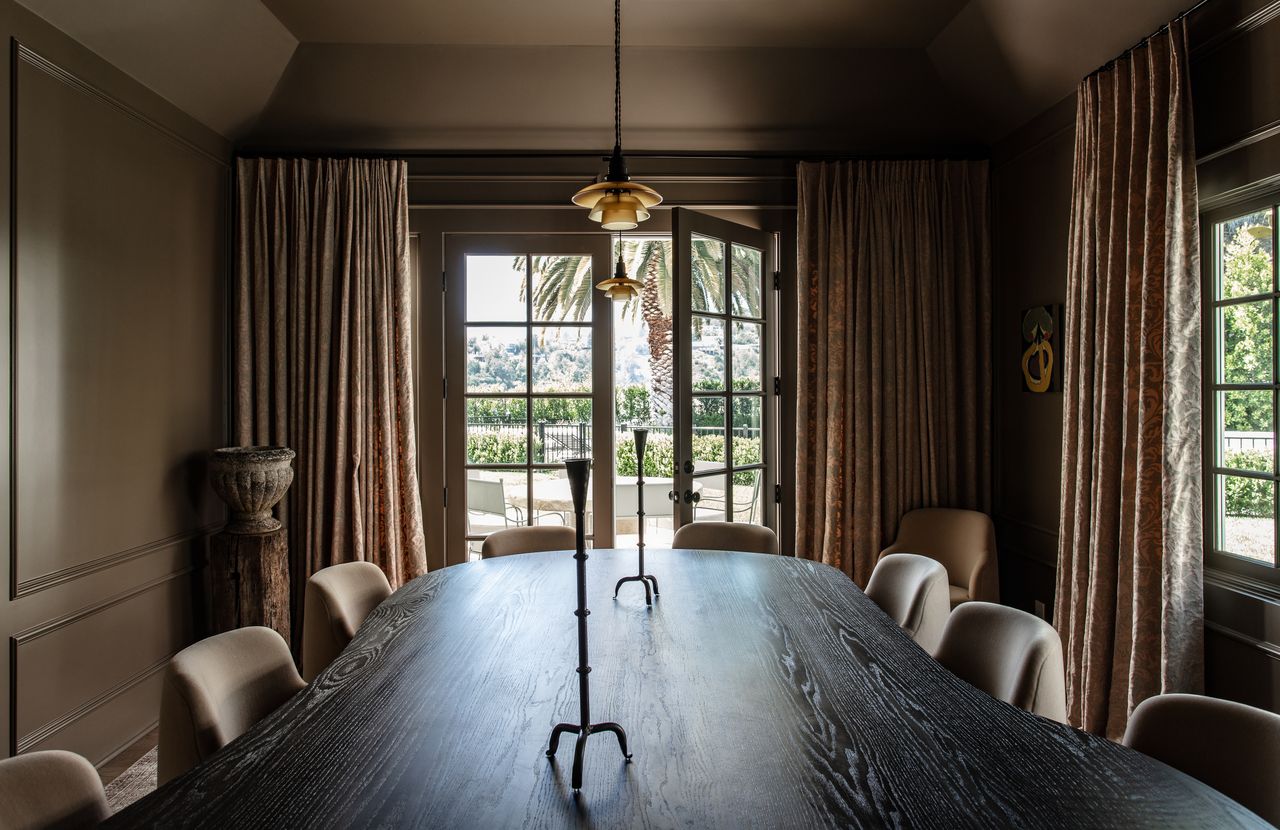 A dining room painted in the deep shades of Broccoli Brown