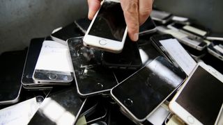 KOCAELI, TURKIYE - OCTOBER 14: A stack of old mobile phones are seen before recycling process in Kocaeli, Turkiye on October 14, 2024. (Photo by Cem Ali Kus/Anadolu via Getty Images)