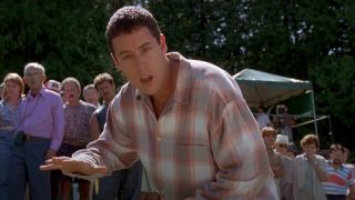 Adam Sandler looks ahead with shock on the golf course in Happy Gilmore.