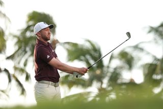 Daniel Berger hits a wedge shot