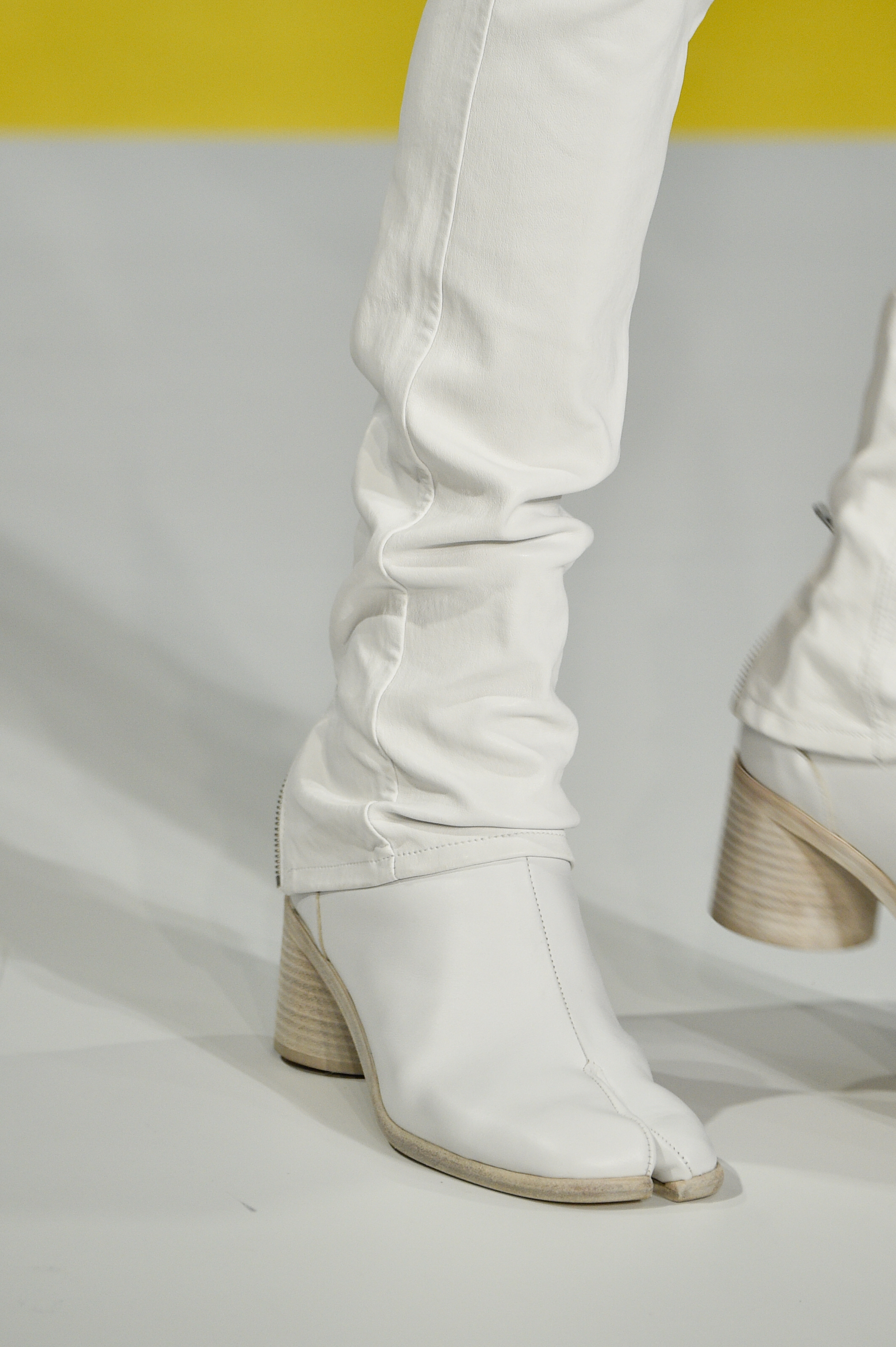 An image of Maison Margiela tabis on the runway.