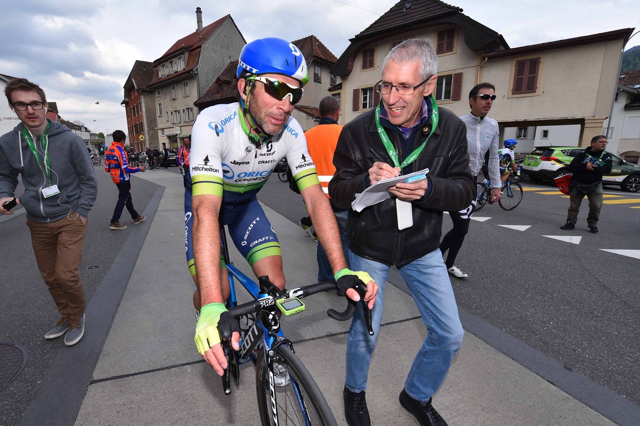 Michael Albasini (Orica-GreenEdge) talks a reporter through victory at the Tour de Romandie.