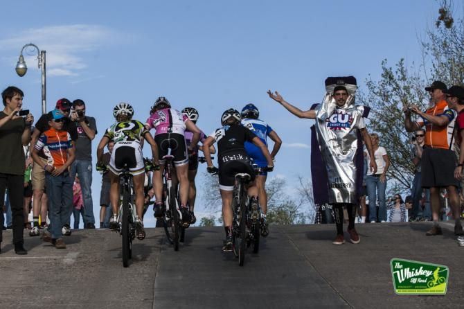 The elite women power up a steep hill in the fat tire crit.