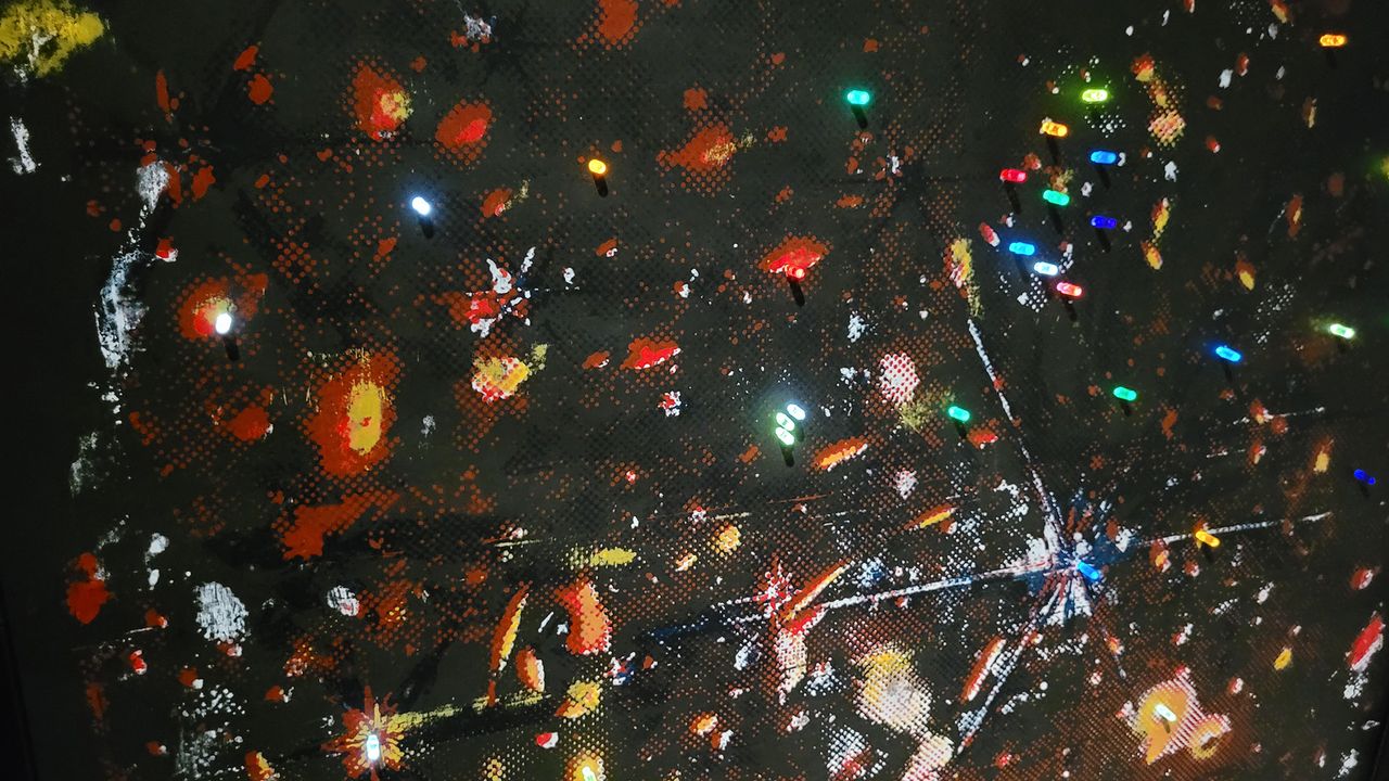 "Deep Field" artwork featuring a"lite-brite' peg board light box on display at Ashley Zelinkskie's "Unfolding the Universe: First Light" exhibit.