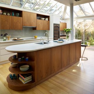 kitchen room with wooden flooring and kitchen worktop