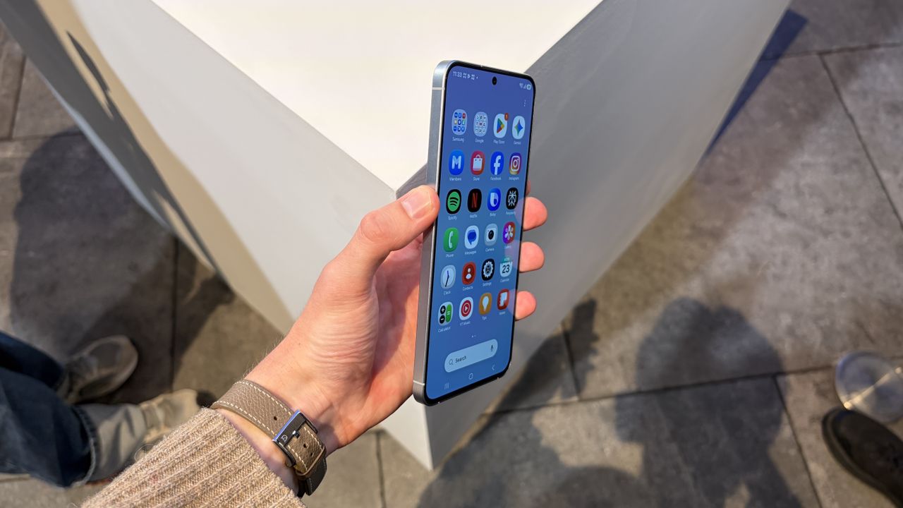 The Samsung Galaxy A57 being held in the hand
