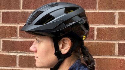 Image shows a rider wearing the Cannondale Junction Adult MIPS helmet