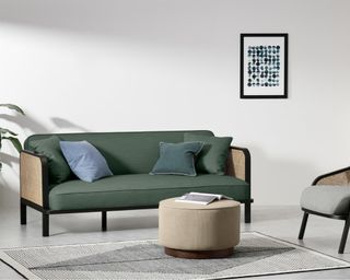 Toriko Click Clack Sofa Bed in green inside living room