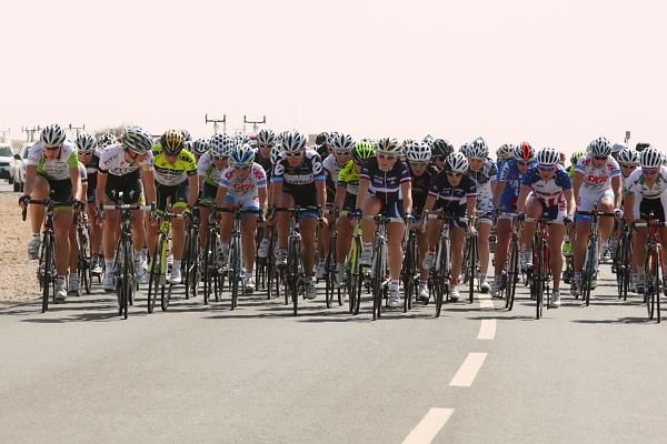 Riders mass at the front of the bunch, the peloton is about to shatter