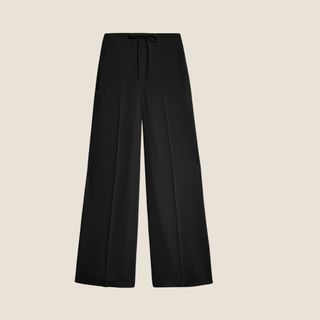 flat lay image of black trousers