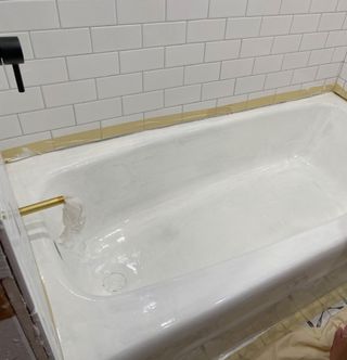 First coat of bathtub refinishing treatment