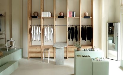 Inside of The Slow concept store featuring wooden shelves
